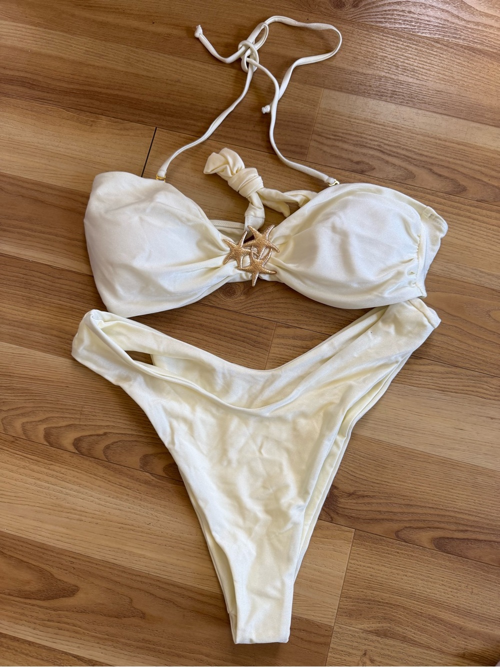 New Cream bikini set with starfish detail.